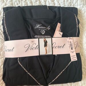 Victoria's Secret "Heavenly" black and cheetah trim pajama set in size medium.